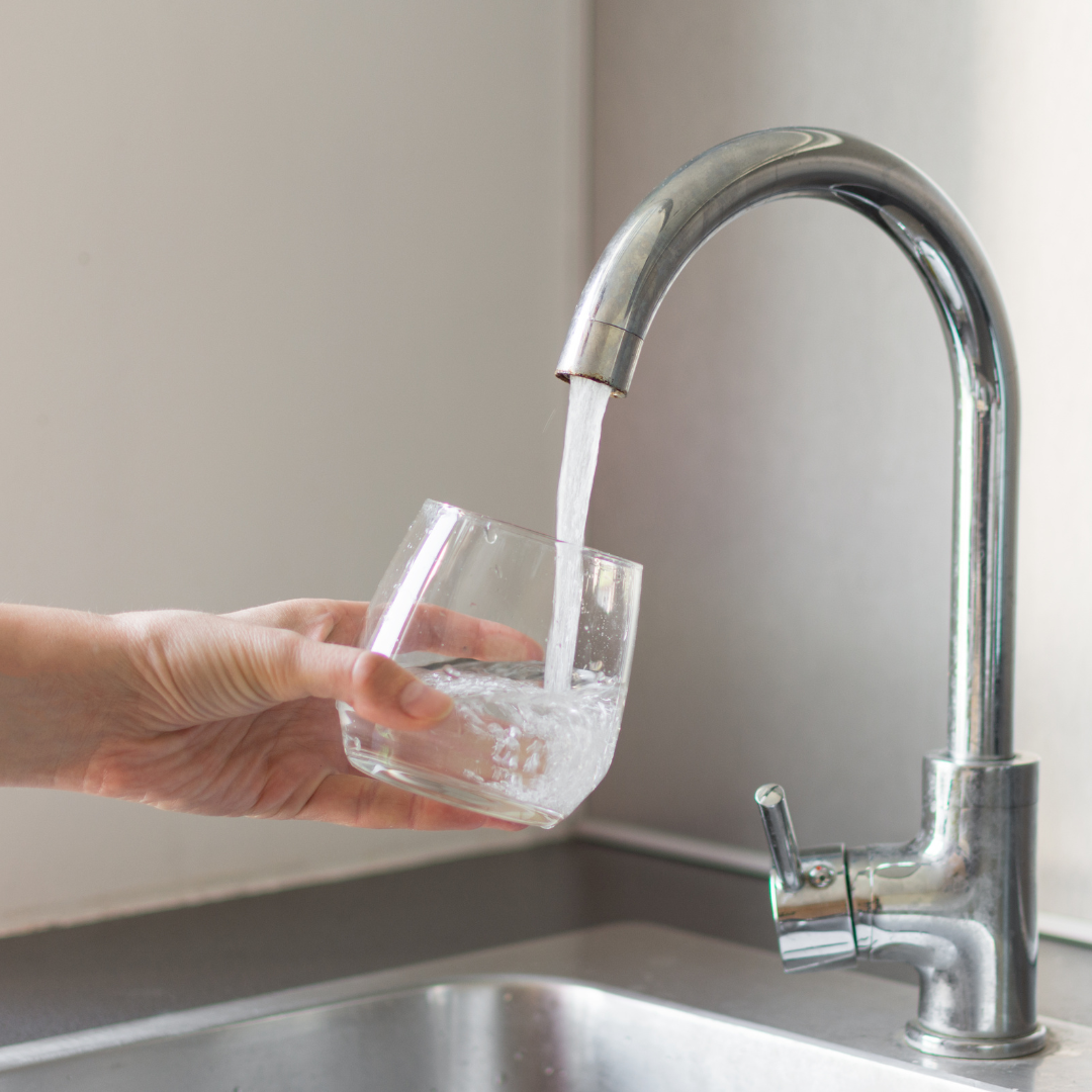 Hand Filling Cup With Tap Water